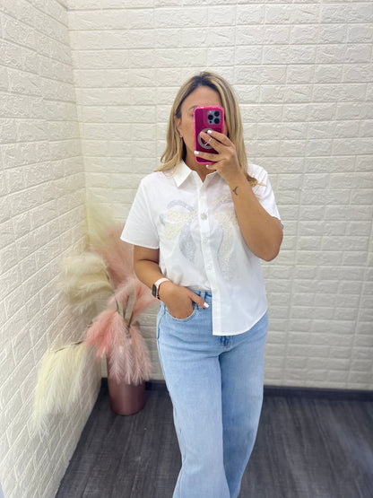 Blusa Color Blanco con Aplicación de Brillos en Moño